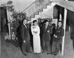 Turnabout Theatre proprietors Forman Brown, Dorothy Neumann, Harry Burnett and Richard Brandon standing in the theater patio on opening night